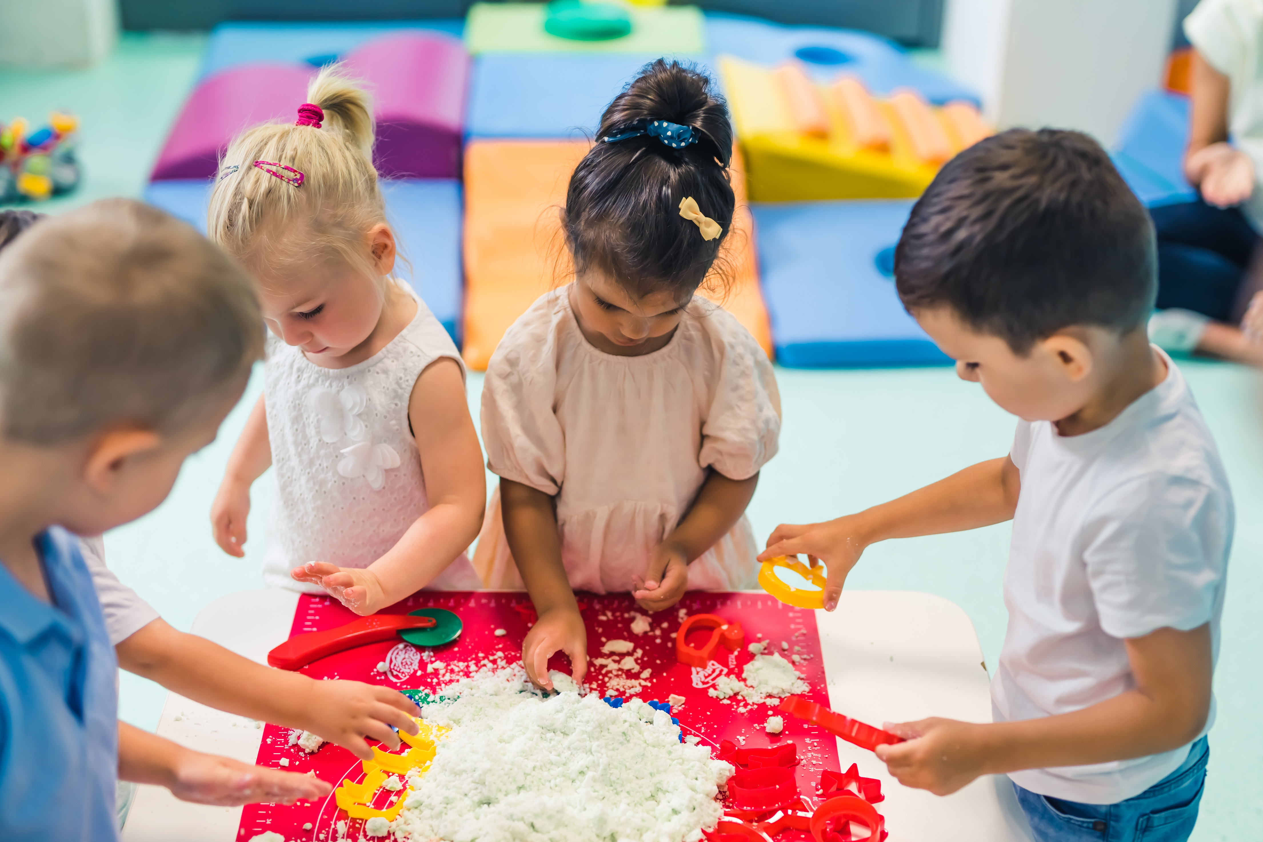 toddlers playing at sensory table